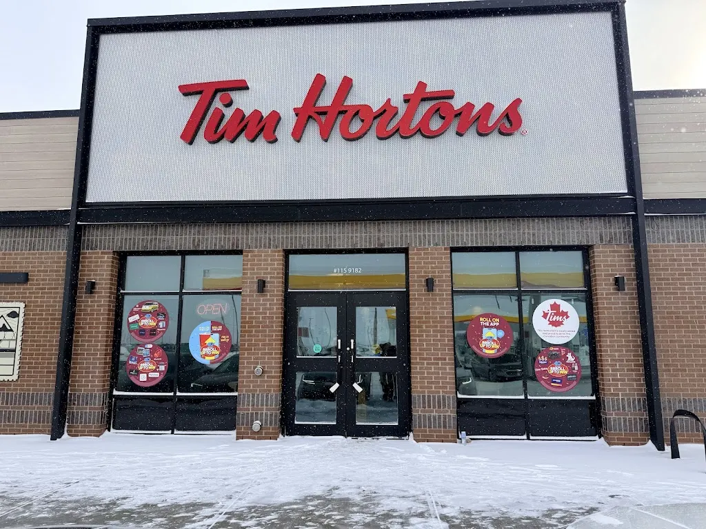 Tim Hortons storefront and interior at 104-1 Junction Drive, Red Deer County, AB
