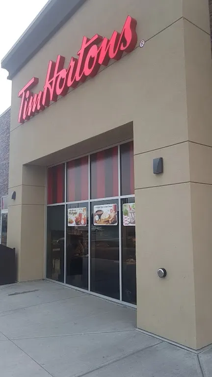 Tim Hortons storefront and interior at 6020 67th St, Red Deer, AB