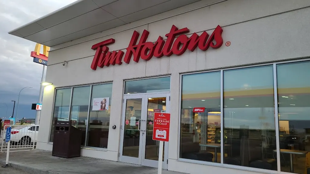 Tim Hortons storefront and interior at 293105 Crossiron Lane, Rocky View County, AB