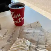 Tim Hortons storefront and interior at 137 Main Blvd, Sherwood Park, AB