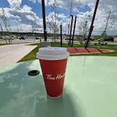 Tim Hortons storefront and interior at 11503 Buffalo Run Blvd, Tsuut'ina, AB