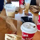Tim Hortons storefront and interior at 11503 Buffalo Run Blvd, Tsuut'ina, AB