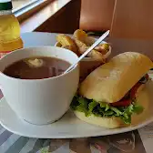 Tim Hortons storefront and interior at 4216 Elko Dr, Whitecourt, AB