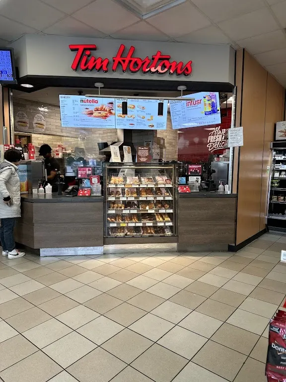 Tim Hortons storefront and interior at 7089 Lougheed Hwy, Burnaby, BC