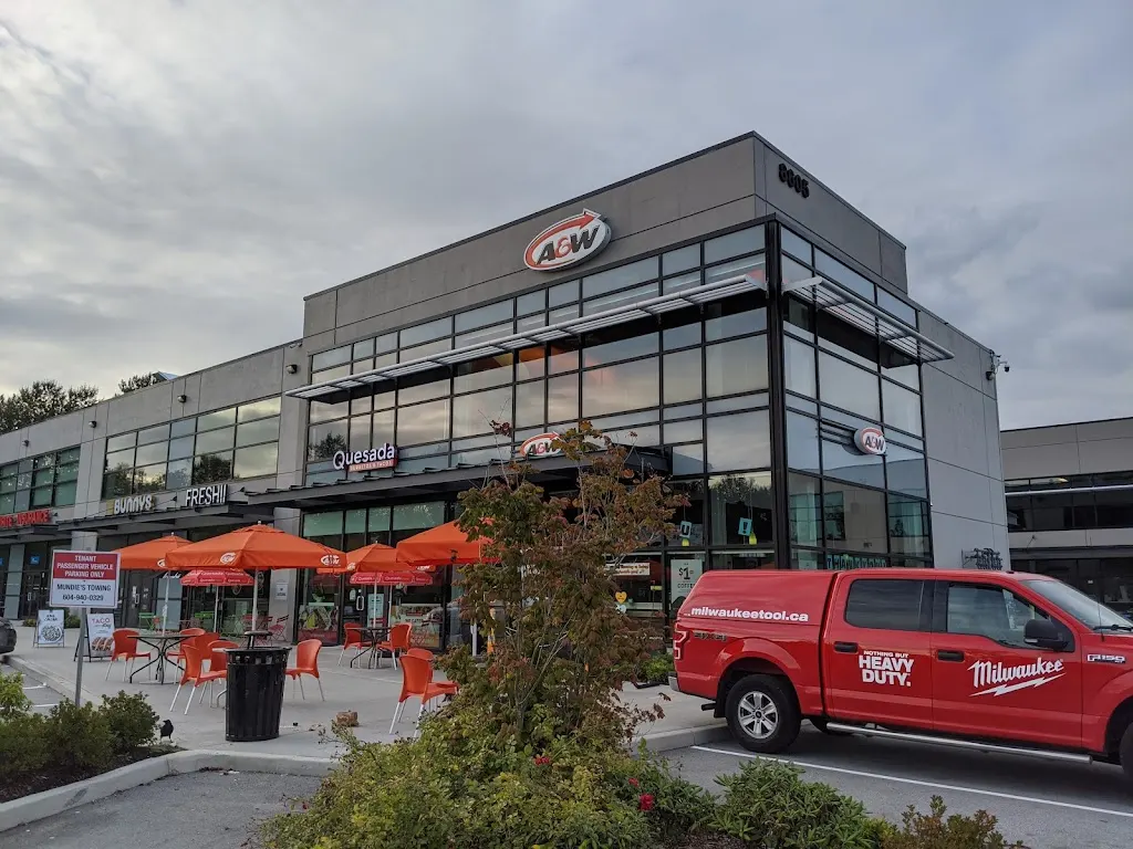 Tim Hortons storefront and interior at 8607 Glenlyon Parkway, Burnaby, BC