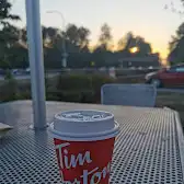 Tim Hortons storefront and interior at 8607 Glenlyon Parkway, Burnaby, BC