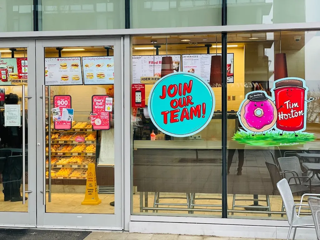 Tim Hortons storefront and interior at 9055 University High Street, Burnaby, BC
