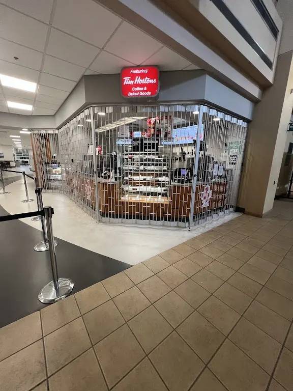 Tim Hortons storefront and interior at 1250 Pinetree Way, Coquitlam, BC