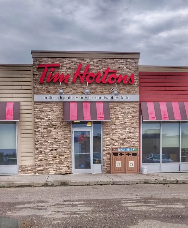 Tim Hortons storefront and interior at 5000 Cordova Way, Fort Nelson, BC