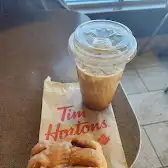 Tim Hortons storefront and interior at 5000 Cordova Way, Fort Nelson, BC