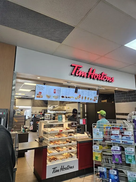 Tim Hortons storefront and interior at 1120 Rogers Way, Kamloops, BC