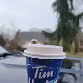 Tim Hortons storefront and interior at 524 6th St, New Westminster, BC