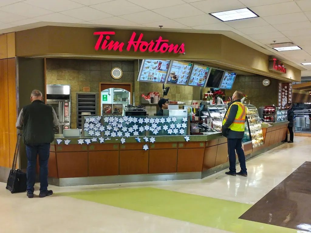 Tim Hortons storefront and interior at Terminal Building, 1640 Electra Blvd, North Saanich, BC