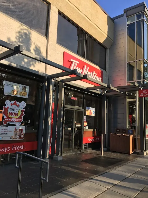 Tim Hortons storefront and interior at 1509 Lonsdale Ave, North Vancouver, BC