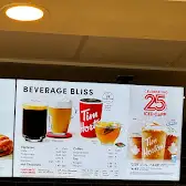 Tim Hortons storefront and interior at 2360 King George Blvd, Surrey, BC