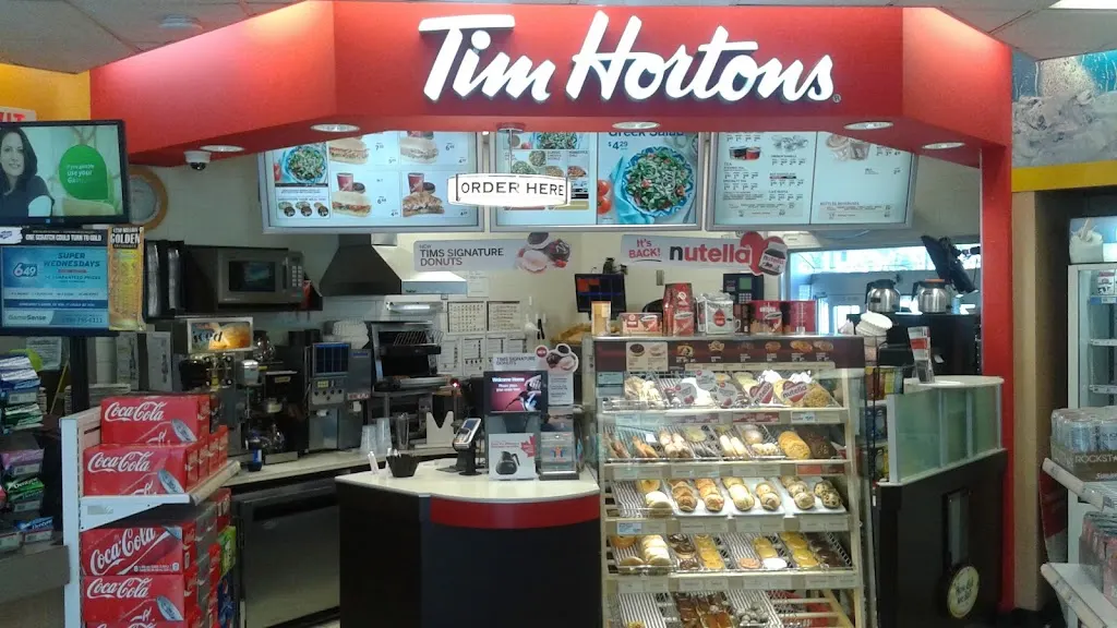 Tim Hortons storefront and interior at 9595 King George Hwy, Surrey, BC