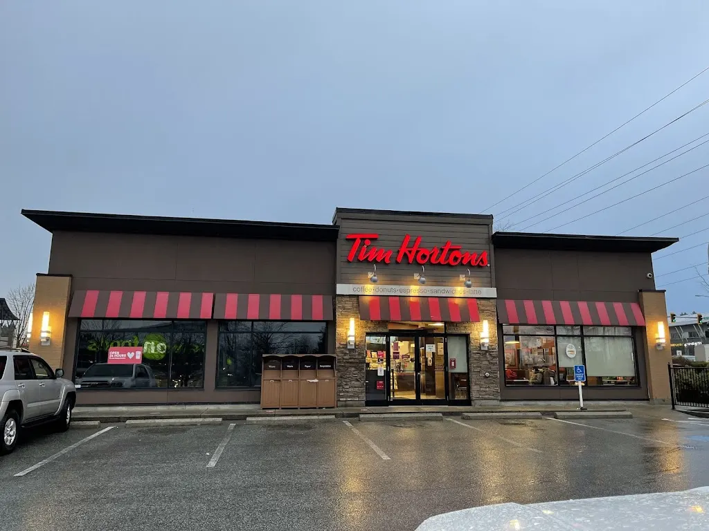 Tim Hortons storefront and interior at 12110 Nordel Way, Surrey, BC