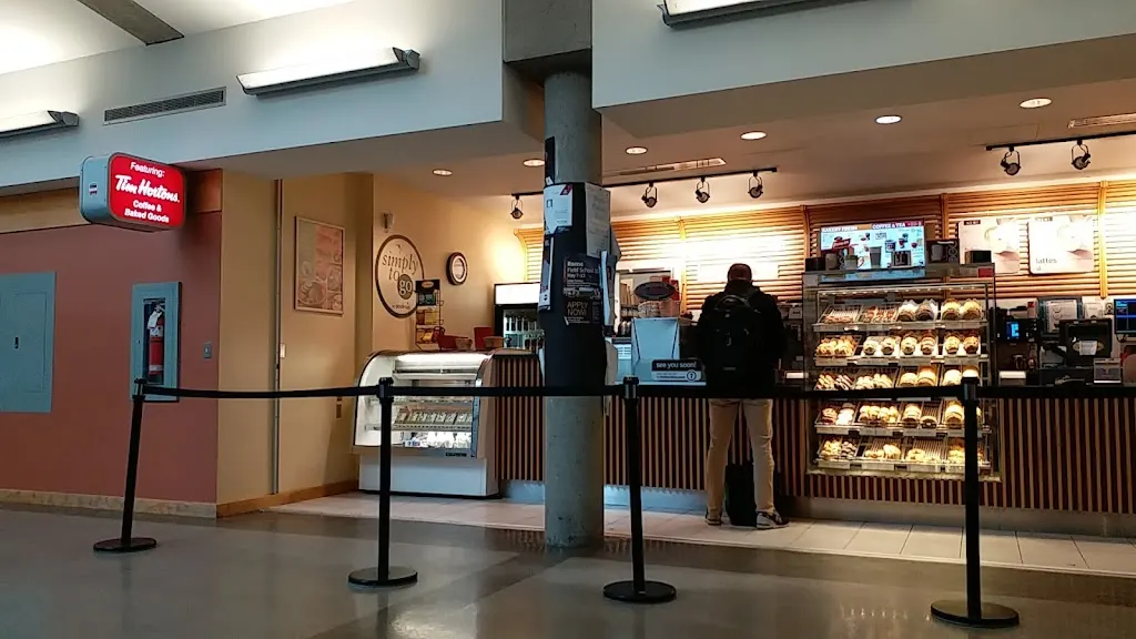 Tim Hortons storefront and interior at 12666 72 Ave, Surrey, BC