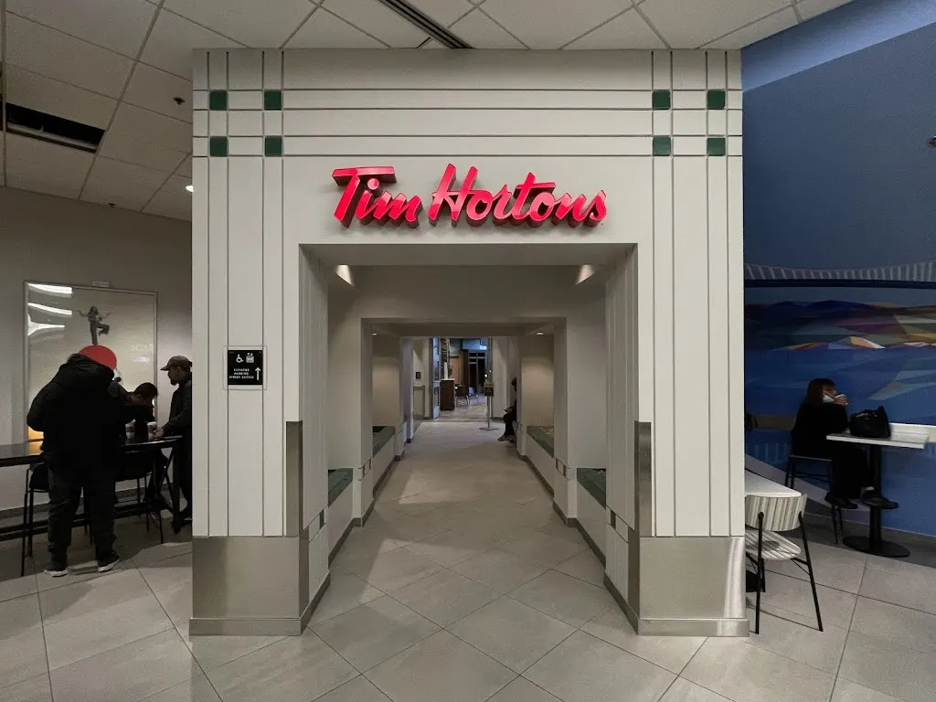 Tim Hortons storefront and interior at 200 Burrard St, Vancouver, BC