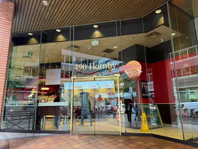Tim Hortons storefront and interior at 490 Hornby St, Vancouver, BC