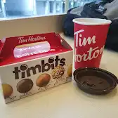 Tim Hortons storefront and interior at 490 Hornby St, Vancouver, BC