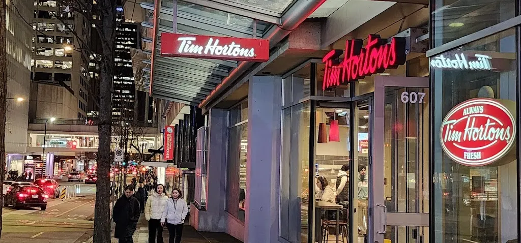 Tim Hortons storefront and interior at 607 Dunsmuir St, Vancouver, BC