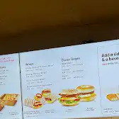 Tim Hortons storefront and interior at 650 Georgia St W, Vancouver, BC
