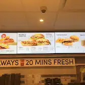 Tim Hortons storefront and interior at 701 Se Marine Dr, Vancouver, BC