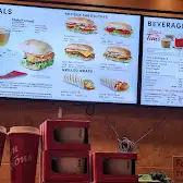 Tim Hortons storefront and interior at 750 West Pender St, Vancouver, BC