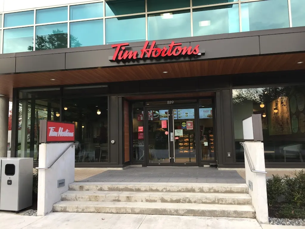 Tim Hortons storefront and interior at 889 Great Northern Way, Vancouver, BC