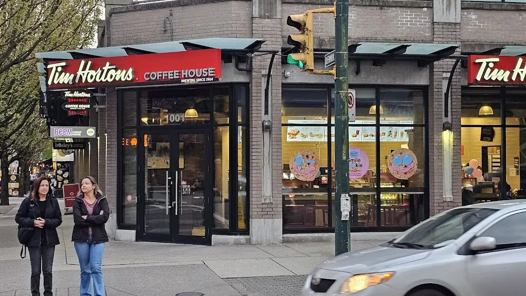 Tim Hortons storefront and interior at 1001 Denman St, Vancouver, BC