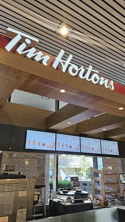 Tim Hortons storefront and interior at 1130 West Pender St, Vancouver, BC