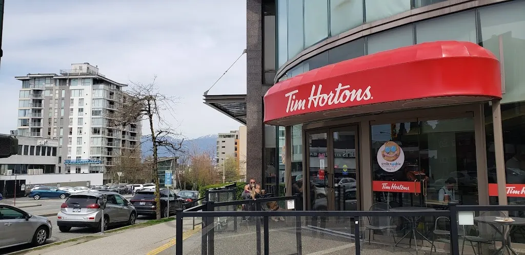 Tim Hortons storefront and interior at 1595 West Broadway, Vancouver, BC