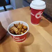 Tim Hortons storefront and interior at 2801 East Hastings, Vancouver, BC