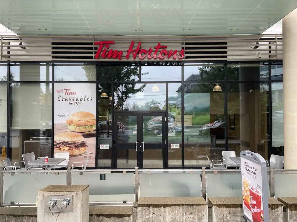 Tim Hortons storefront and interior at 2889 East 12th Avenue, Vancouver, BC