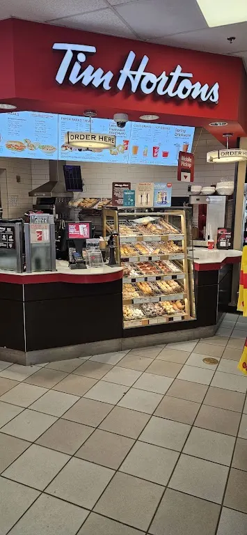 Tim Hortons storefront and interior at 3502 East Hastings St, Vancouver, BC