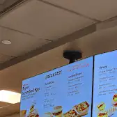 Tim Hortons storefront and interior at 4065 Cambie Street, Vancouver, BC