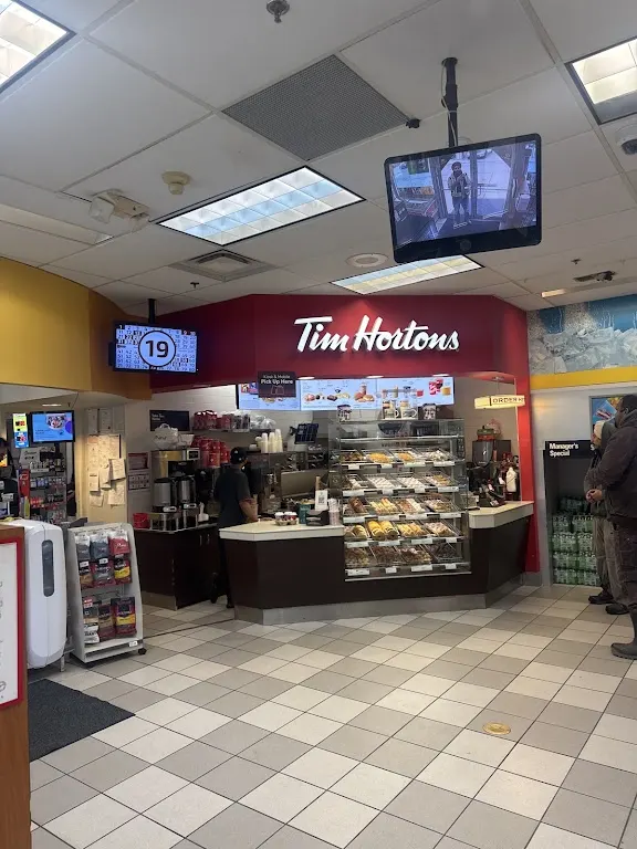Tim Hortons storefront and interior at 6525 Oak St, Vancouver, BC