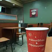 Tim Hortons storefront and interior at 3501 Ravine Way, Victoria, BC