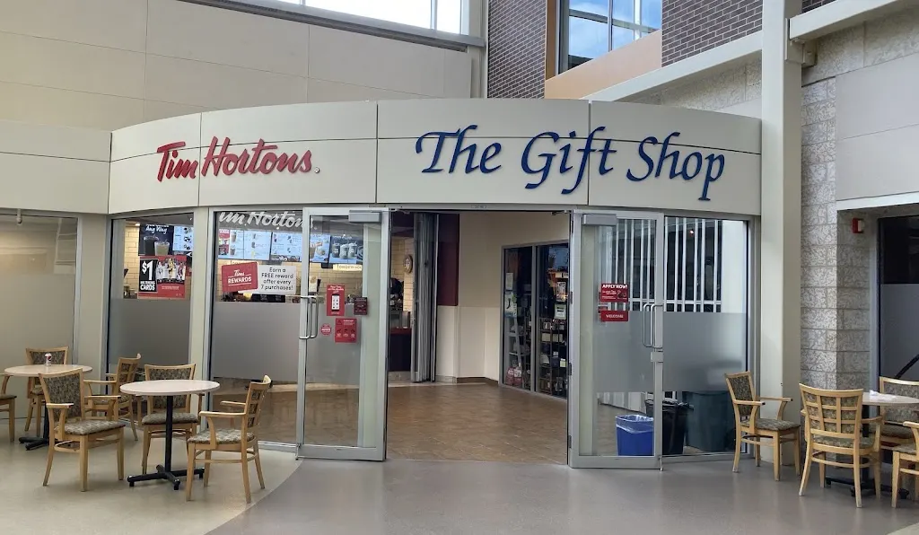 Tim Hortons storefront and interior at 150 Mctavish Ave East, Brandon, MB