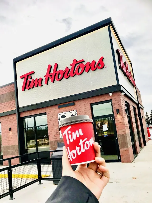 Tim Hortons storefront and interior at 150 4th Ave, Carman, MB