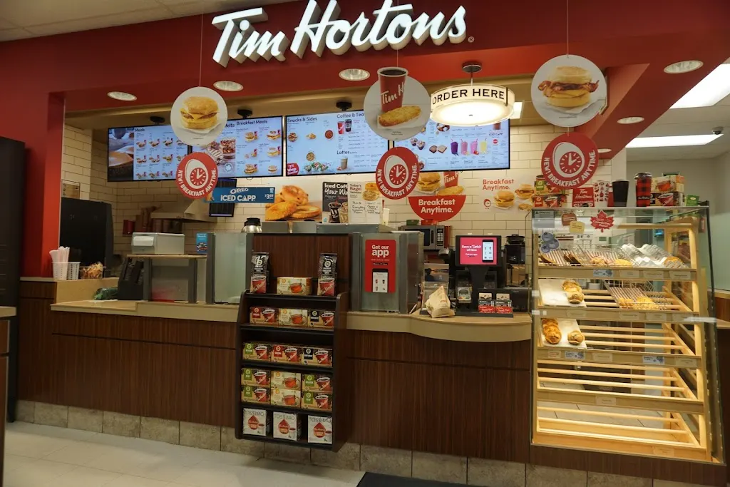 Tim Hortons storefront and interior at 25 Dennis Street, Gladstone, MB