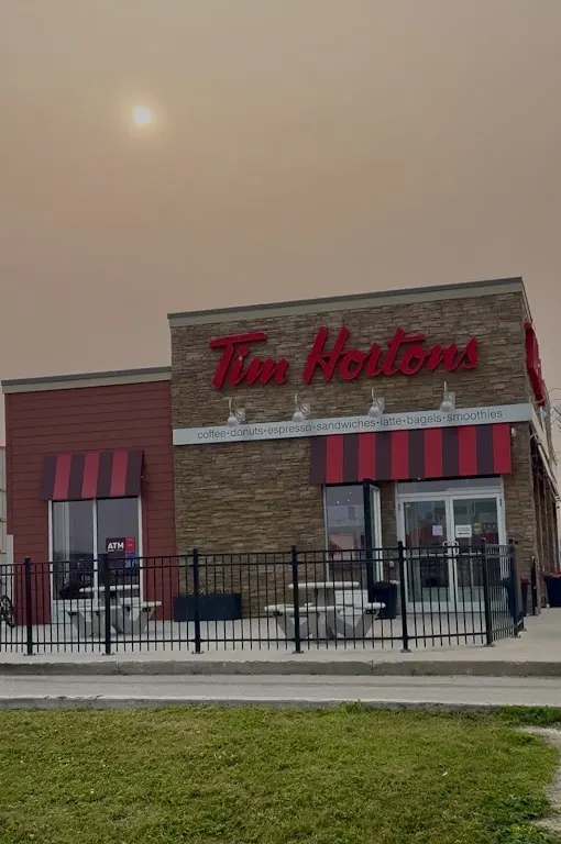 Tim Hortons storefront and interior at Hwy 75 South, Morris, MB