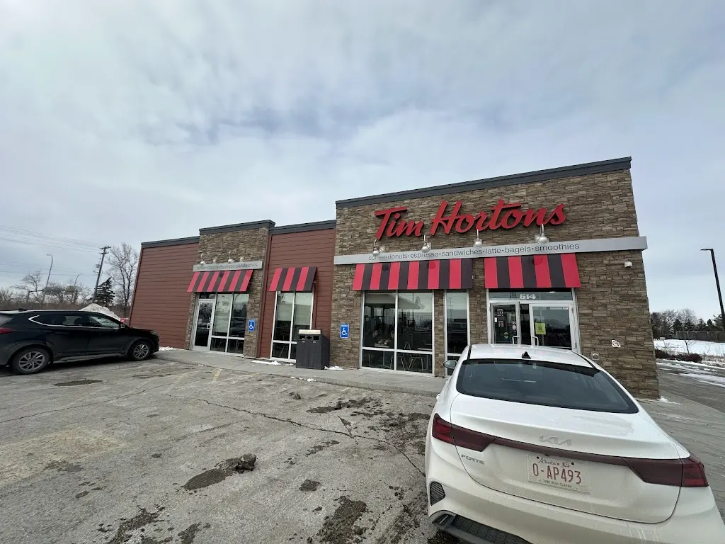 Tim Hortons storefront and interior at 614 Lagimodiere Blvd, Winnipeg, MB