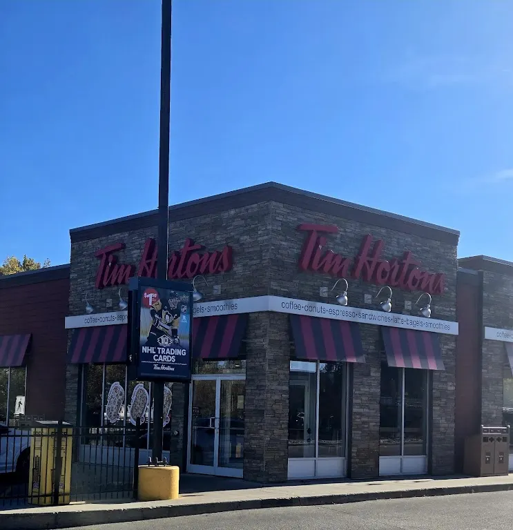 Tim Hortons storefront and interior at 1060 Henderson Hwy, Winnipeg, MB