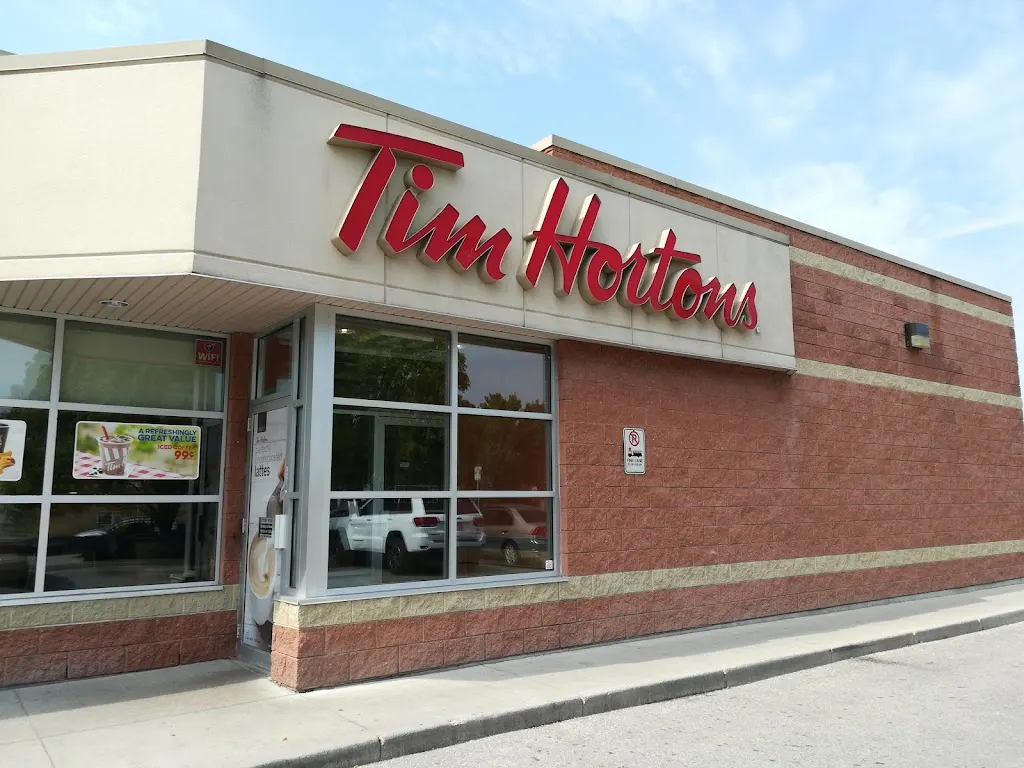 Tim Hortons storefront and interior at 1590 Notre Dame, Winnipeg, MB