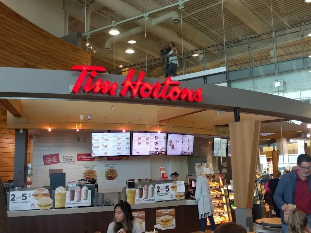 Tim Hortons storefront and interior at 777 Aviation Ave - Past Security Check, Dieppe, NB