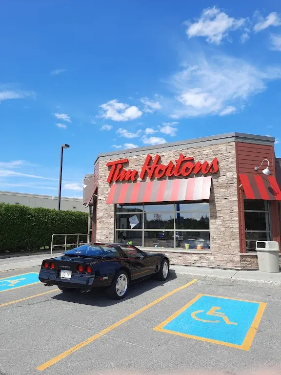 Tim Hortons storefront and interior at 155 Victoria Rd, Edmundston, NB