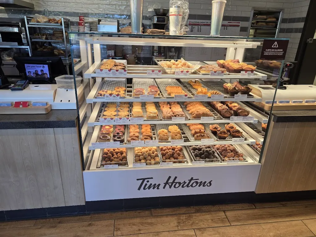 Tim Hortons storefront and interior at 54 Rue Canada, Saint Quentin, NB