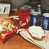 Tim Hortons storefront and interior at 8 Trans Canada Highway, Bishops Falls, NL